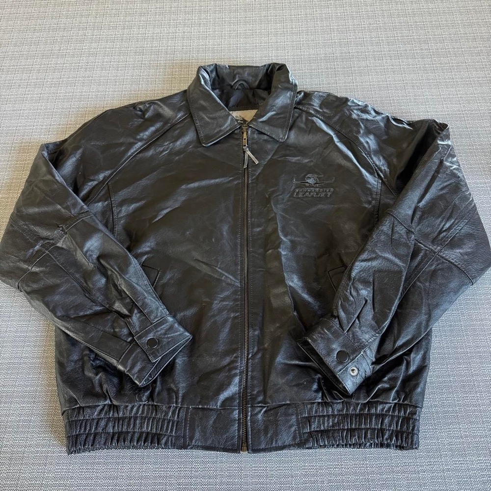 Burks Bay "Bombardier LearJet" vintage black genuine leather jacket in size S